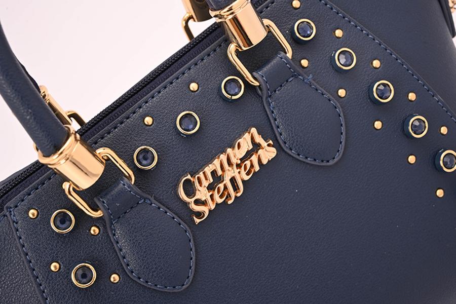 MINI BAG AZUL CON TACHAS