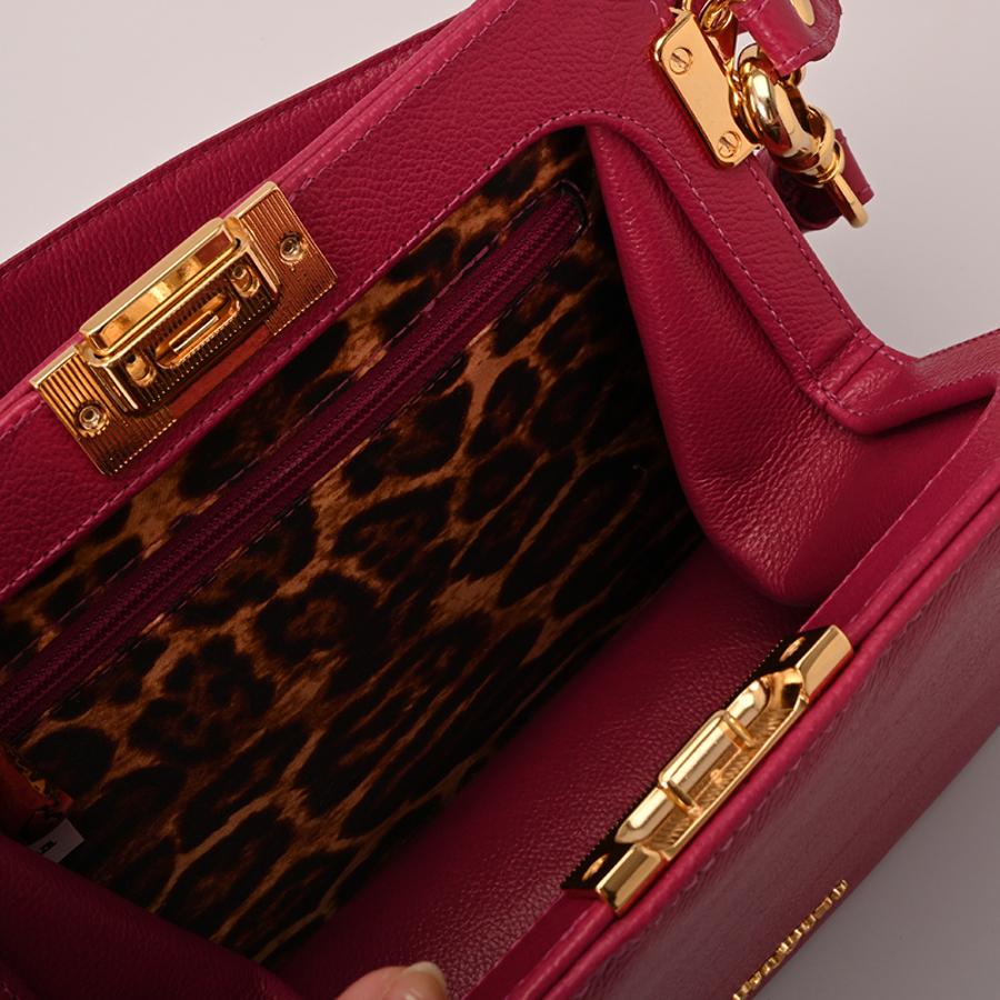 BANDOLERA FUCSIA CS