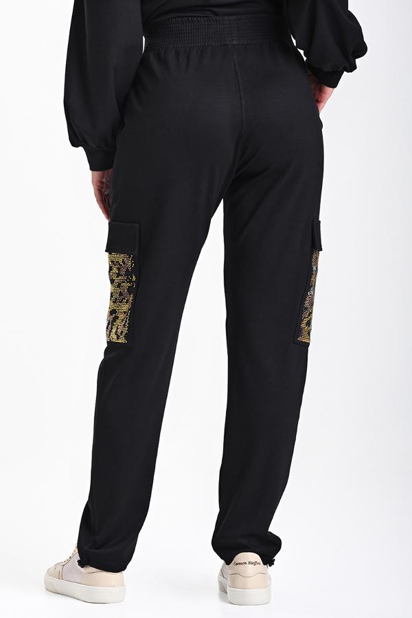 PANTALON JOGGER CON BRILLO ANIMAL PRINT